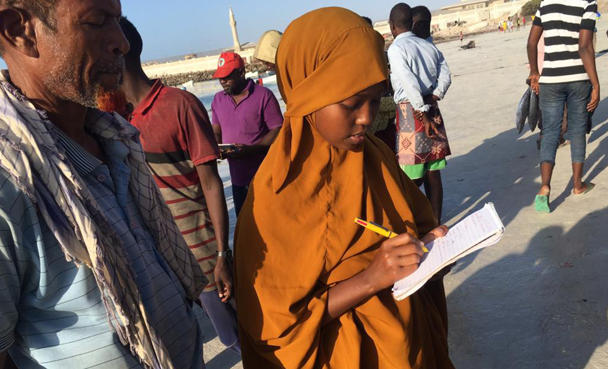 Somali student interviews fisherman